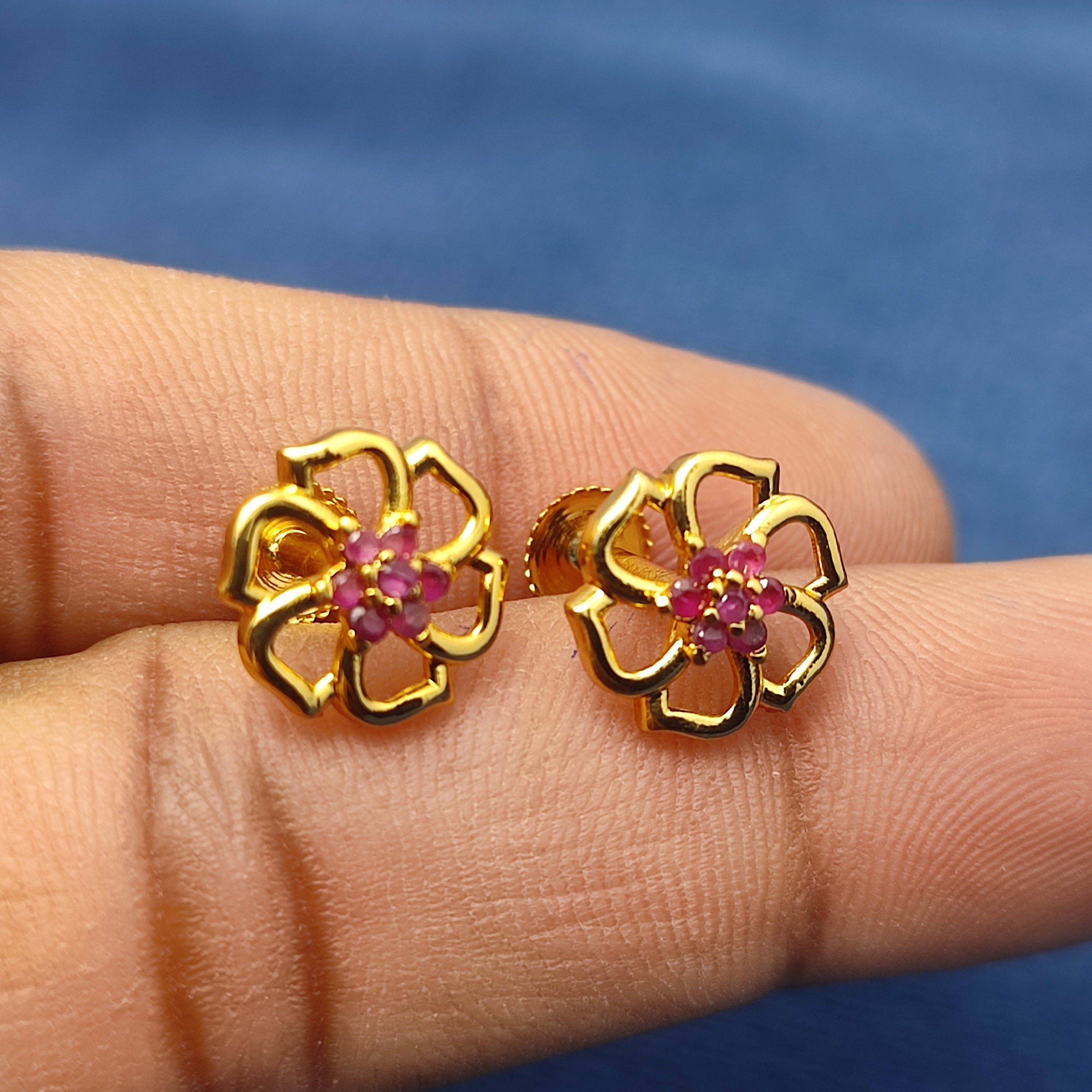 Gold plated floral earrings with pink stone