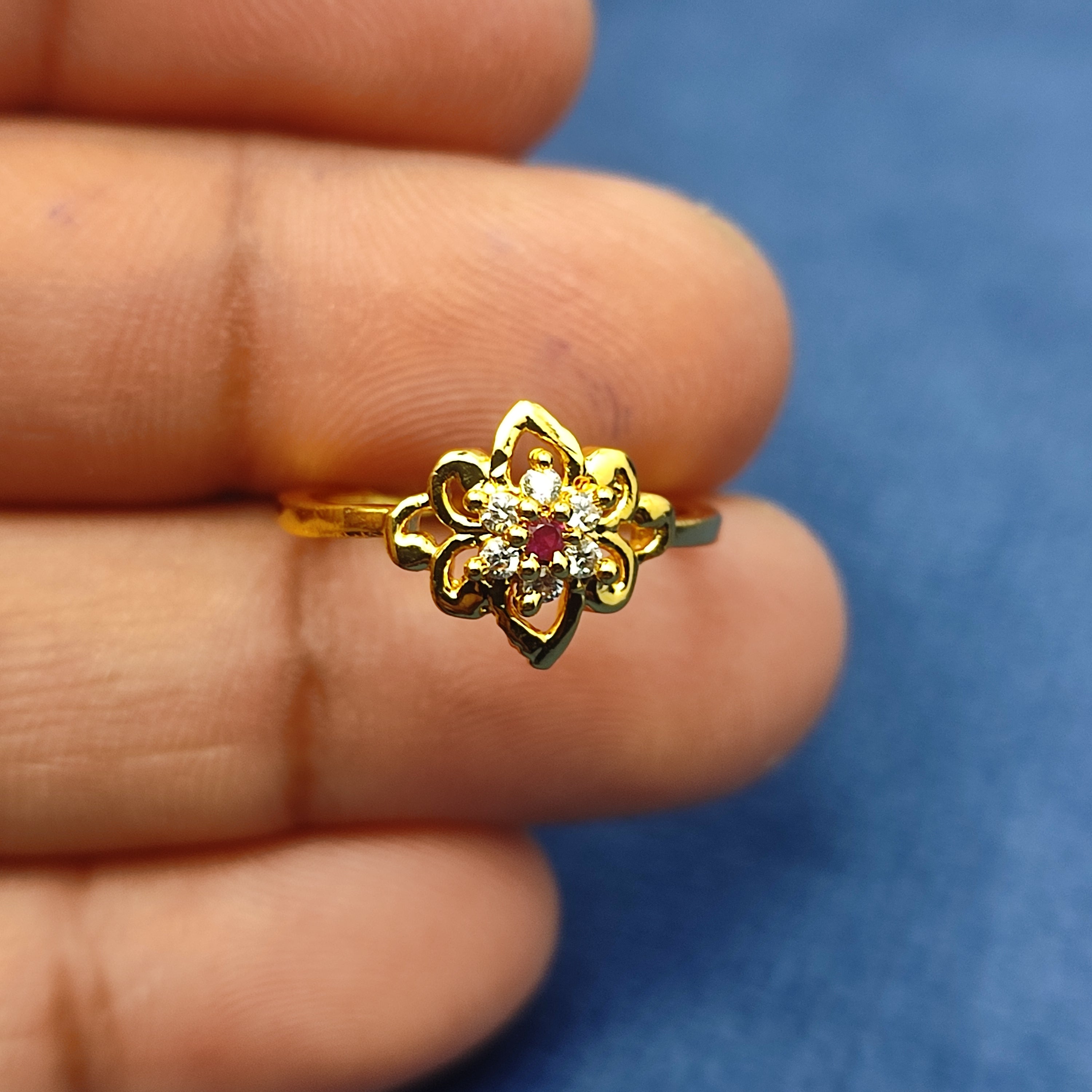 Gold plated floral Ring with red stone