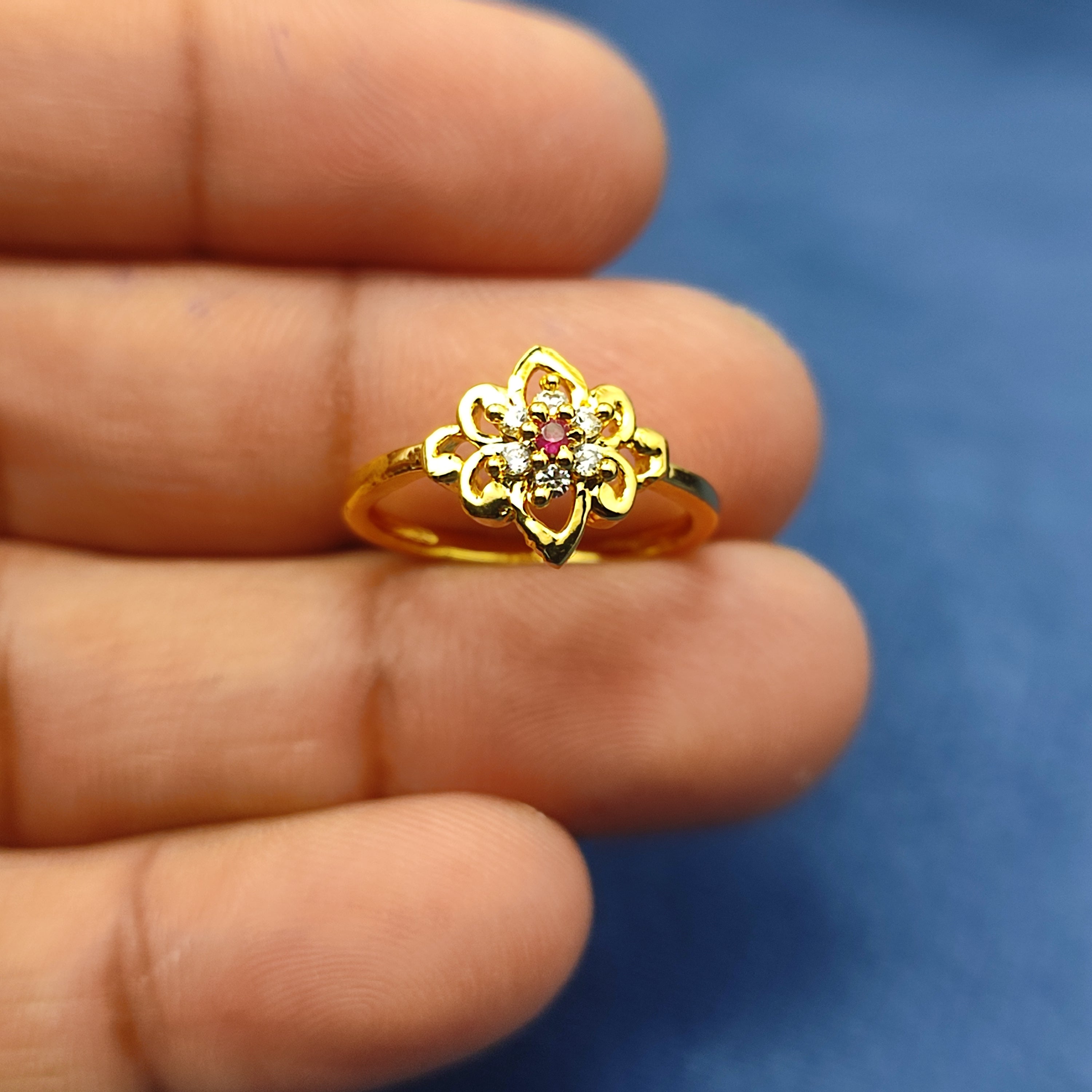 Gold plated floral Ring with red stone