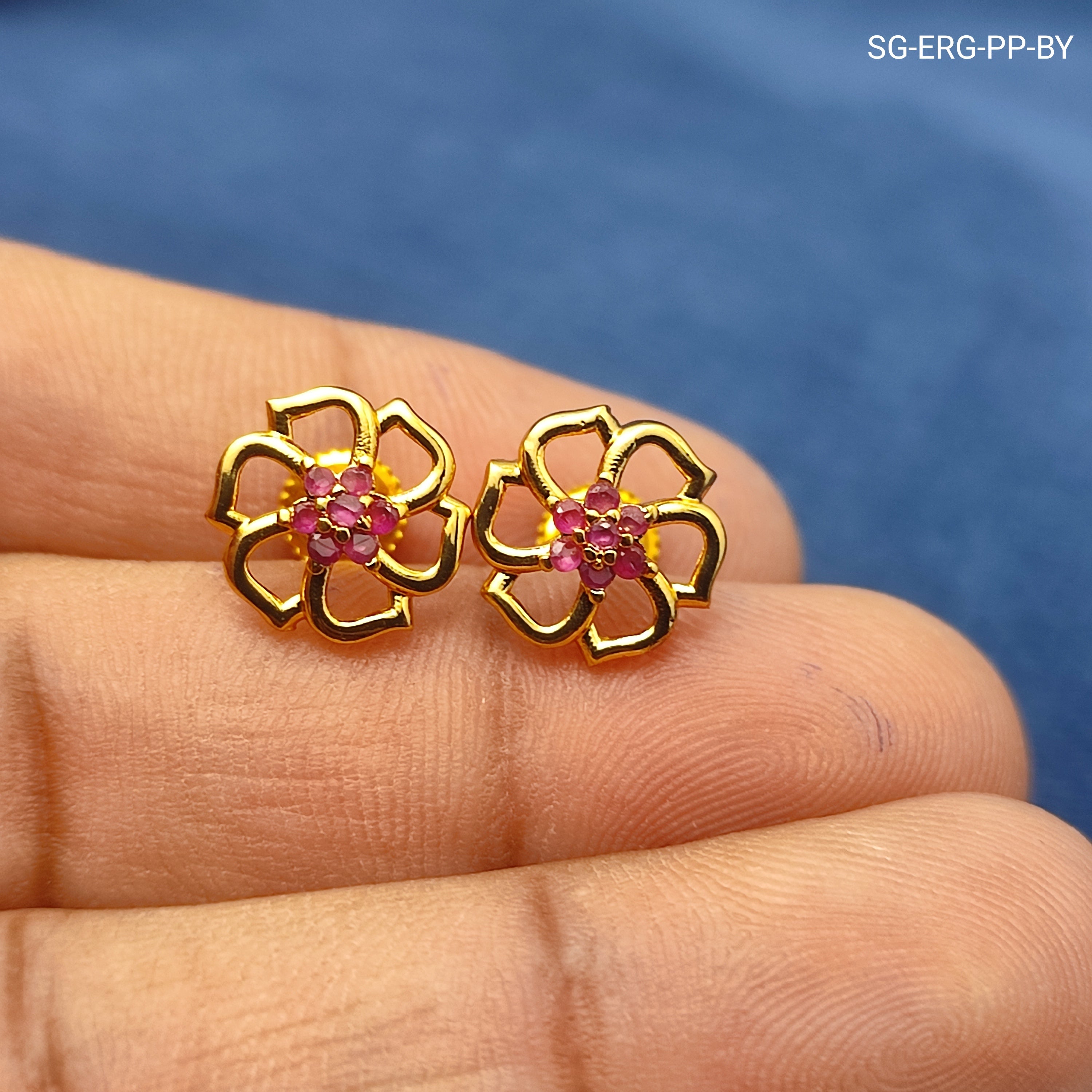 Gold plated floral earrings with pink stone