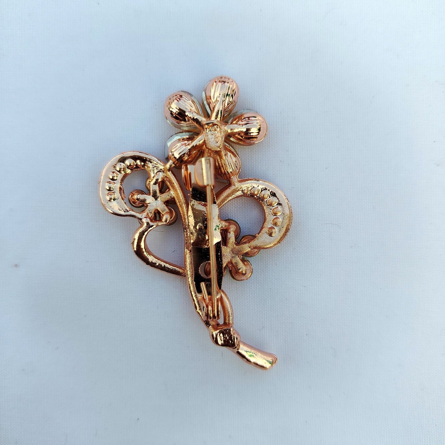 Champagne Crystal Scrollwork Saree Clip - Rose Gold Floral Brooch with AB Rhinestones