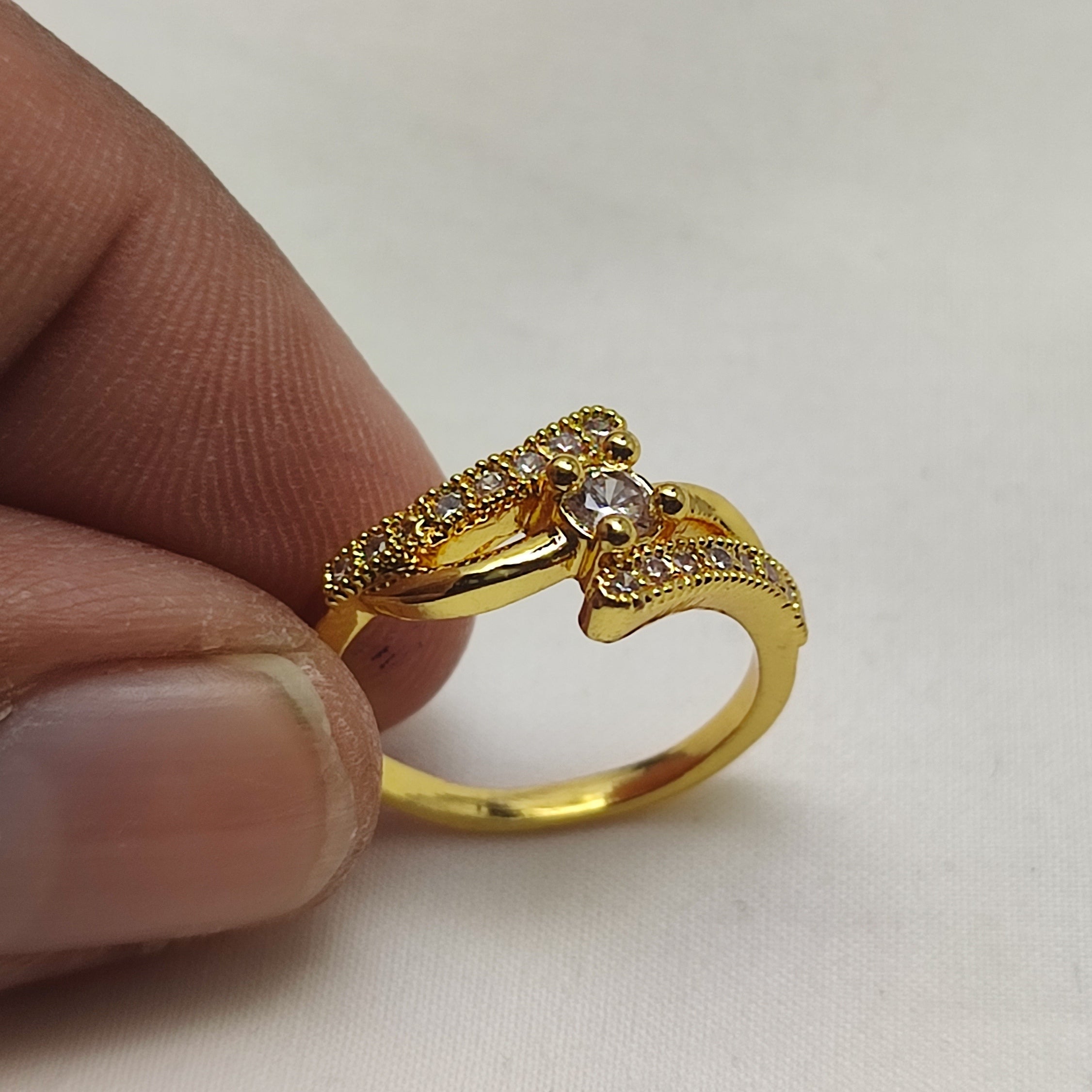 An elegant gold ring White