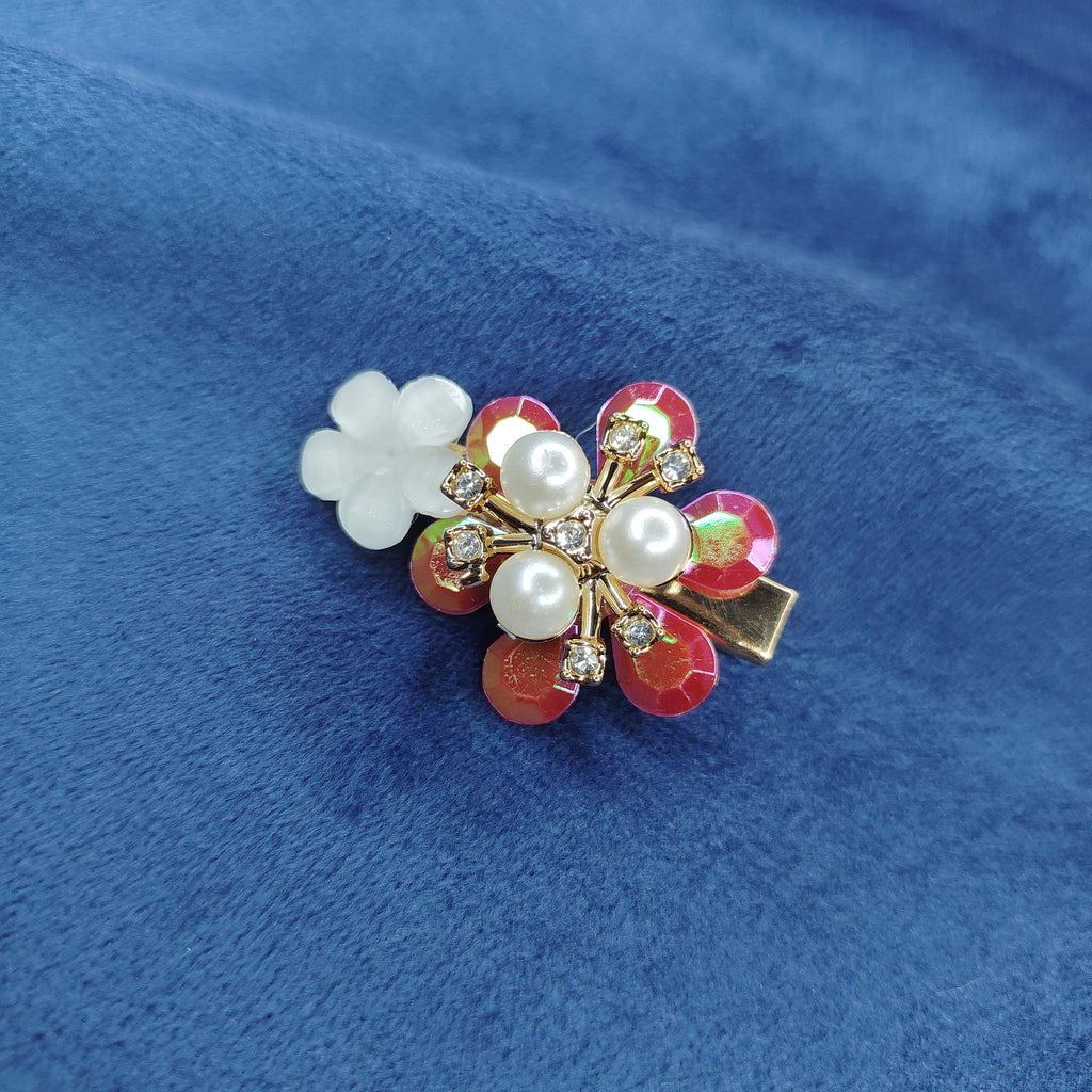 Elegant floral pearl hair clip with delicate stone work