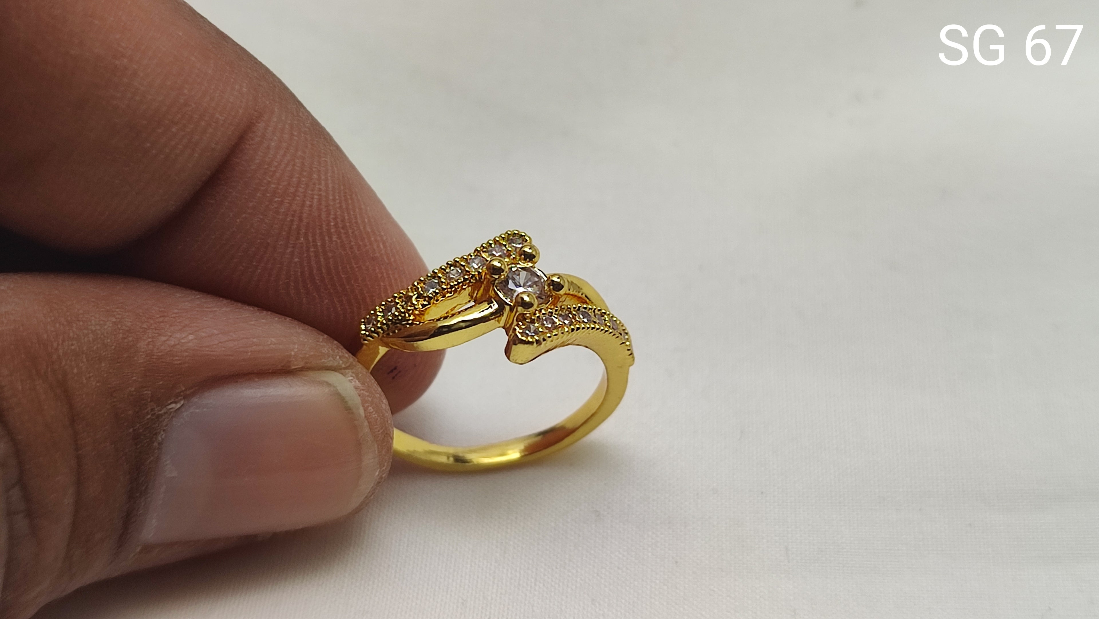 An elegant gold ring White