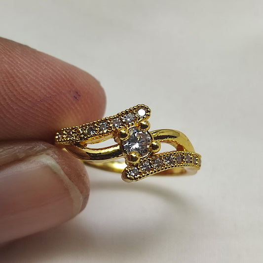 An elegant gold ring White