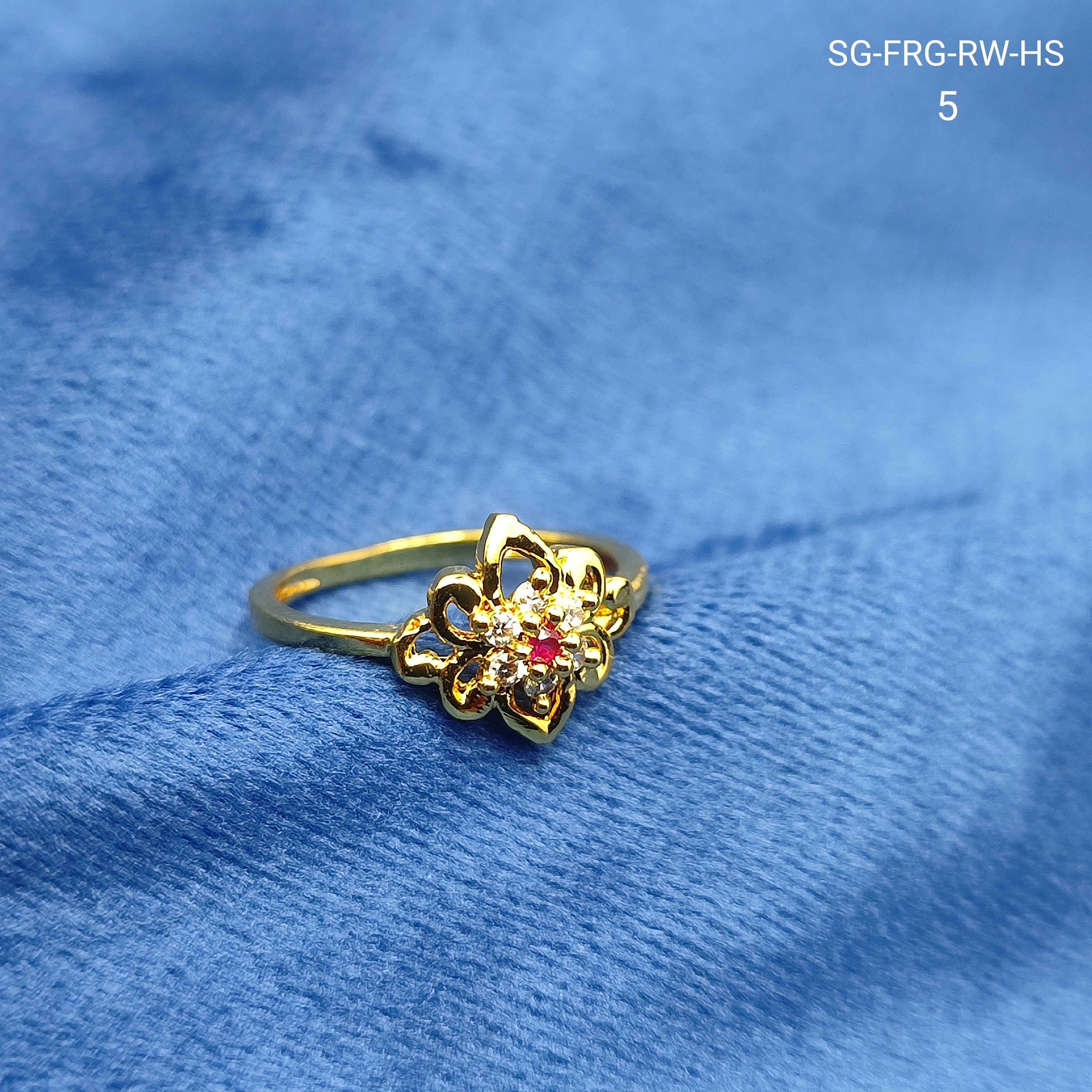 Gold plated floral Ring with red stone