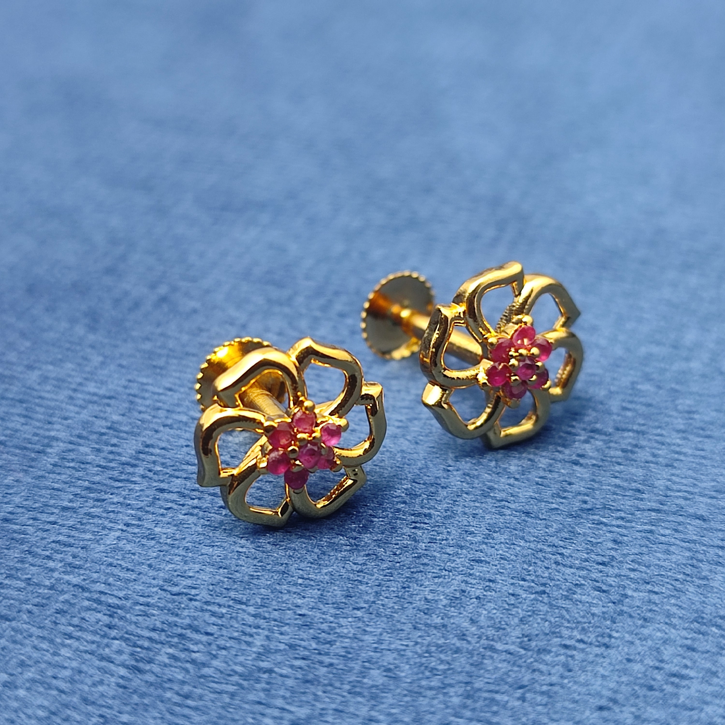 Gold plated floral earrings with pink stone